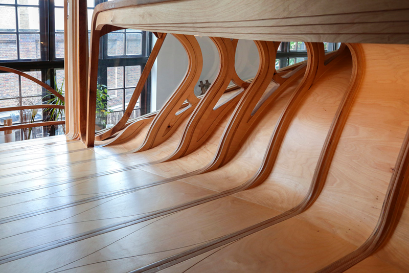 Illustration for article titled Bendy Wooden Room Snaps Together Like Tetris, Takes Over House